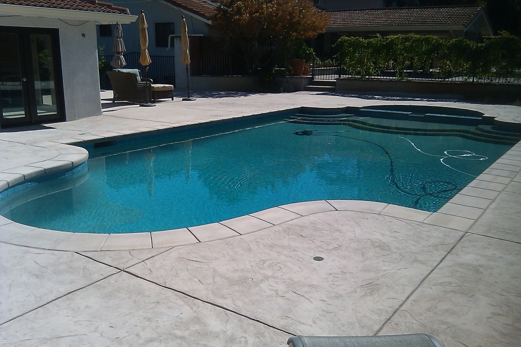 Modern Stamped Concrete Pool Deck for Simple Design